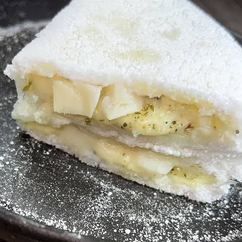 Queijo mussarela com palmito picado e orégano
