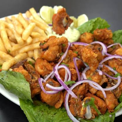 Aprox. 600g de Frango a passarinho bem temperado e aprox. 400g de batata frita deliciosa.