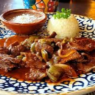 bistec con tomate