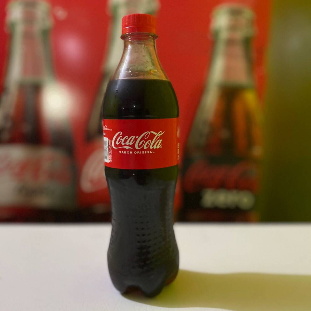 Botella de Coca Cola.
