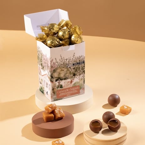 Caixa de bombons de chocolate ao leite com recheio de caramello salgado. Contém 132g