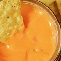 Dip de queso cheddar.