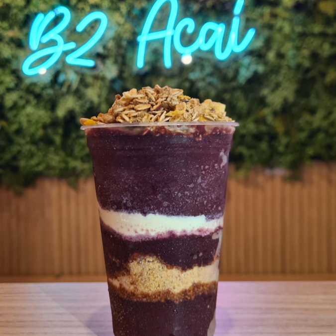 Açaí super cremoso no copo, feito em camadas com acompanhamentos escolhidos por você. (Não enviamos acompanhamentos separados)