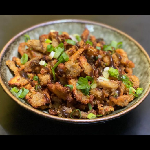 Shimeji empanado na farinha panko com molho tonkatsu e cebolinha. 150g.