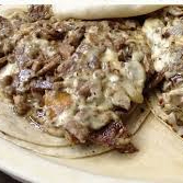 Taco de bistec con queso
