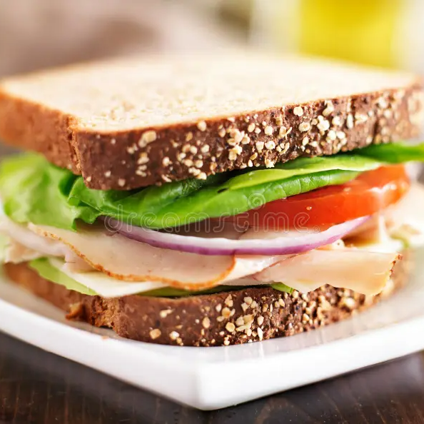 1 Sandwich c/Pollo + Jugo de Naranja 1lt