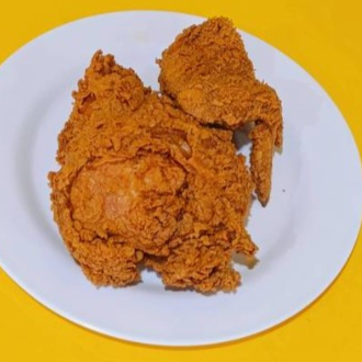 2 Piezas de Pollo Frito Pechuga y Ala