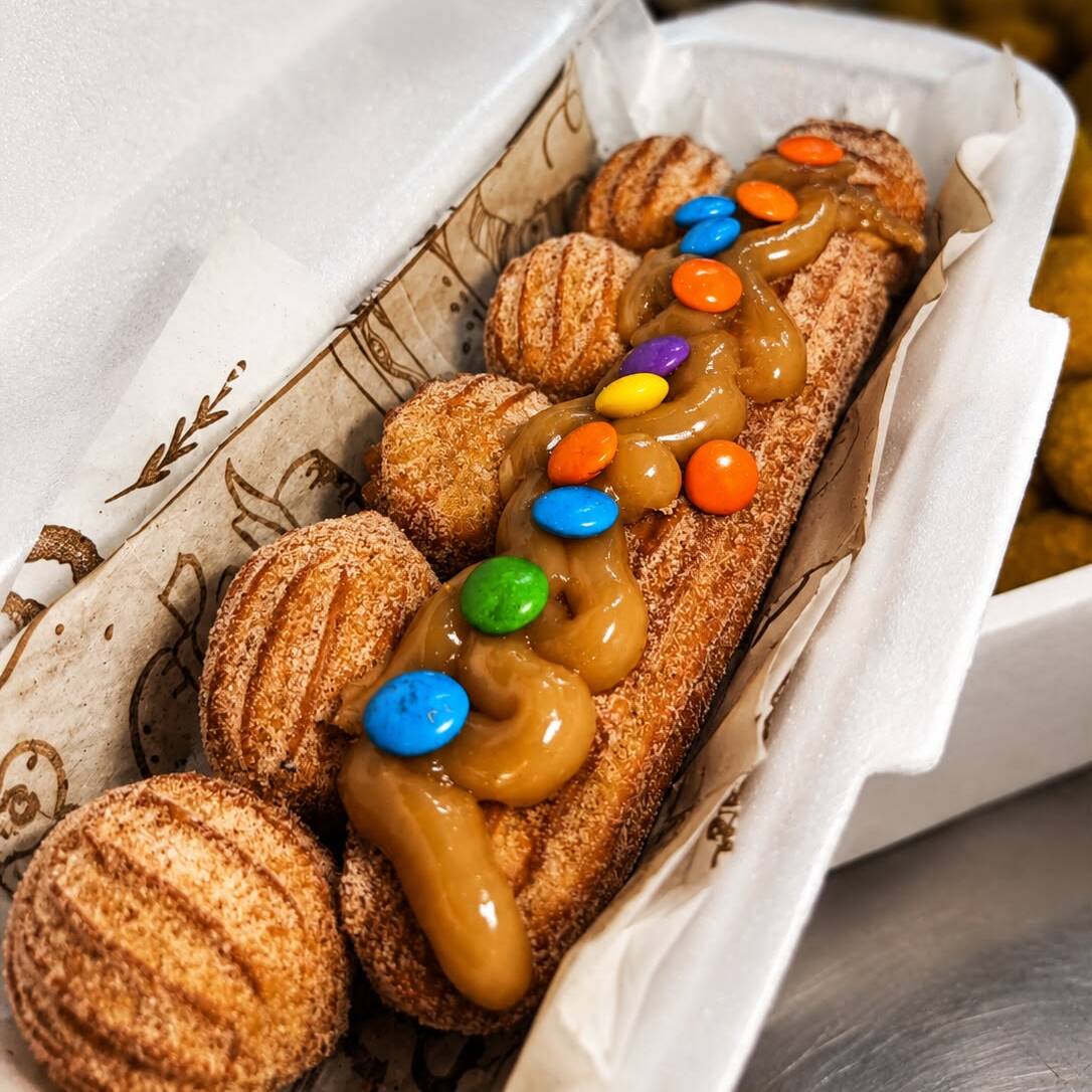 1 Churrros de 15cm com Doce de leite.