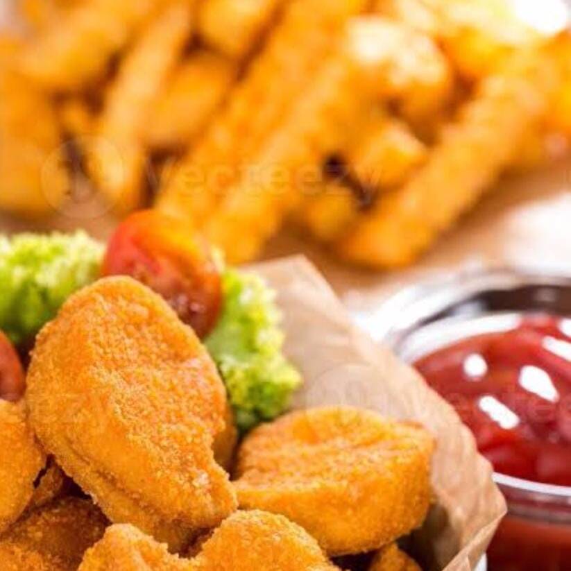 Nuguets de Pollo con Papas a la Francesa