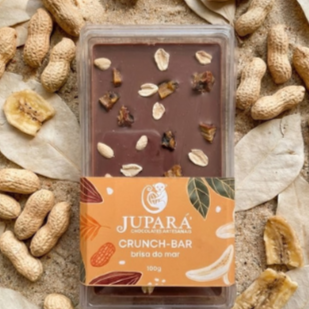 Chocolate branco, coco queimado, castanha de caju e damasco. Uma explosão de sabores tropicais, com crocância e doçura em cada pedaço.