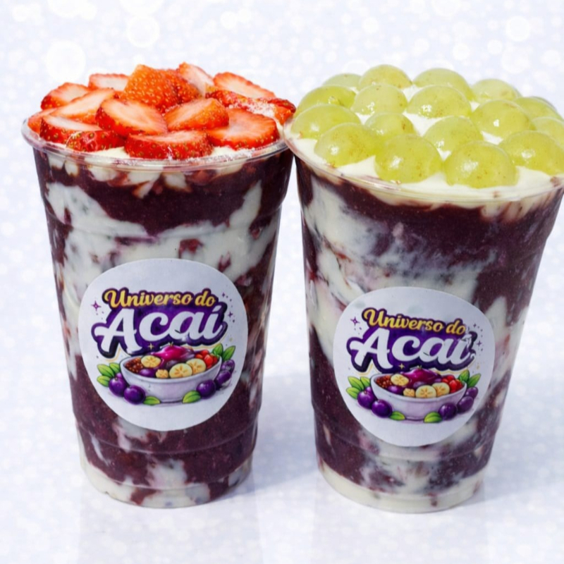 A combinação perfeita da cremosidade do nosso Creme de Ninho com o sabor intenso do açaí . Escolha entre o frescor do Morango ou a doçura da Uva sem sementes. Uma explosão de sabor em cada colherada!