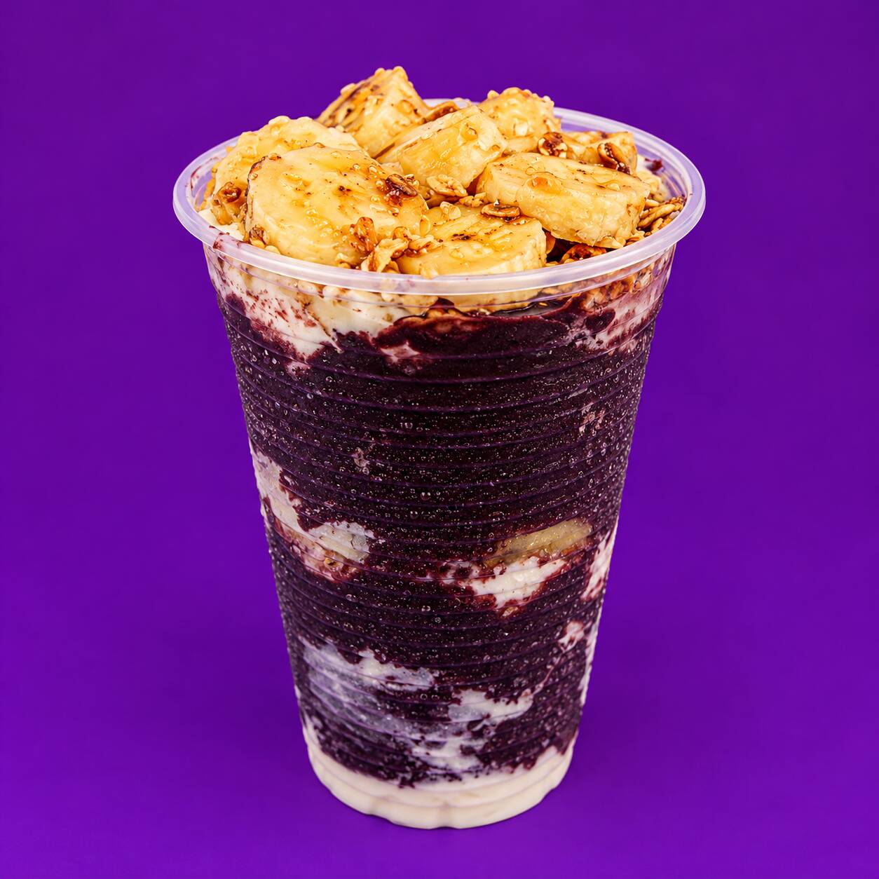 Açaí 500ml + 5 Complementos Açaí cremoso e delicioso, servido no copo de 500ml e acompanhado de complementos à sua escolha. Monte sua combinação favorita e aproveite cada colherada!