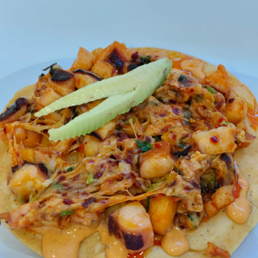 TOSTADA DE PULPO AL AJILLO CON QUESO