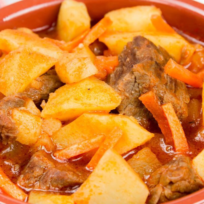 Taco de Papa con Carne en salsa roja