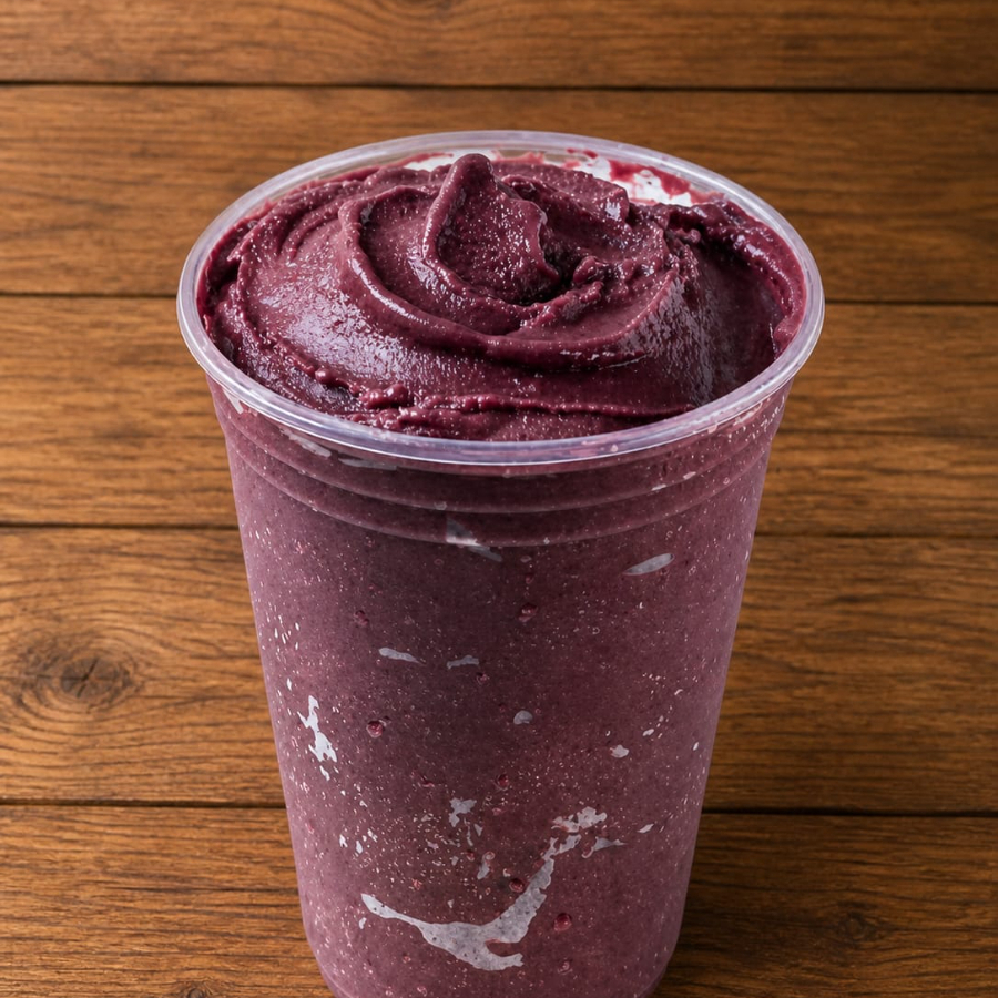 Nosso super cremoso e saboroso creme de açaí livre de cristais de gelo enviado no copo
