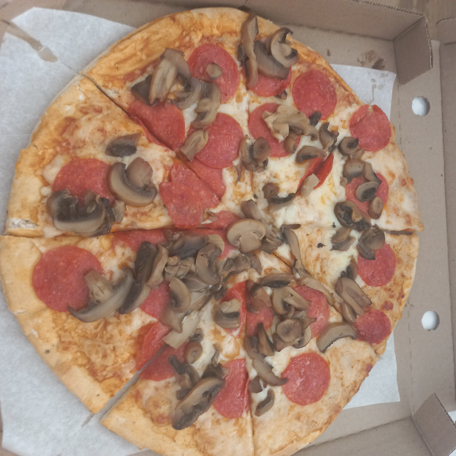Pizza de Champinones