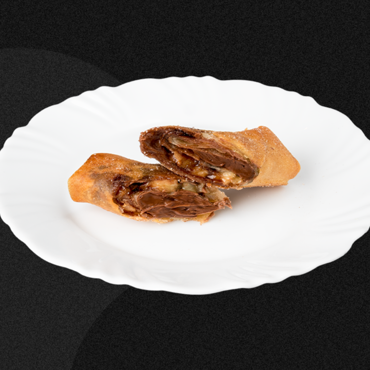 Massa fina crocante com chocolate e banana. Imagens meramente ilustrativas.
