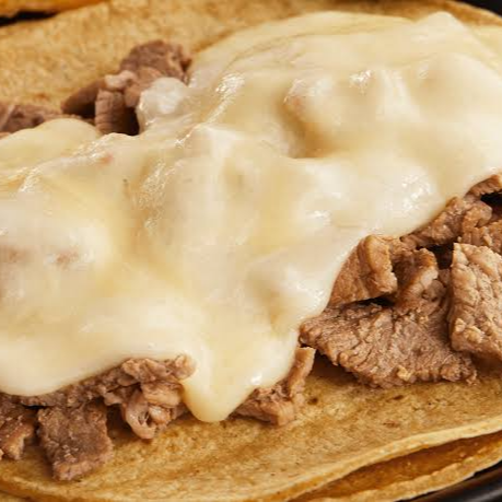 Taco de Bistec de Res con Queso.