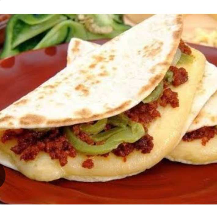 Quesadilla con Bistec Encebollado