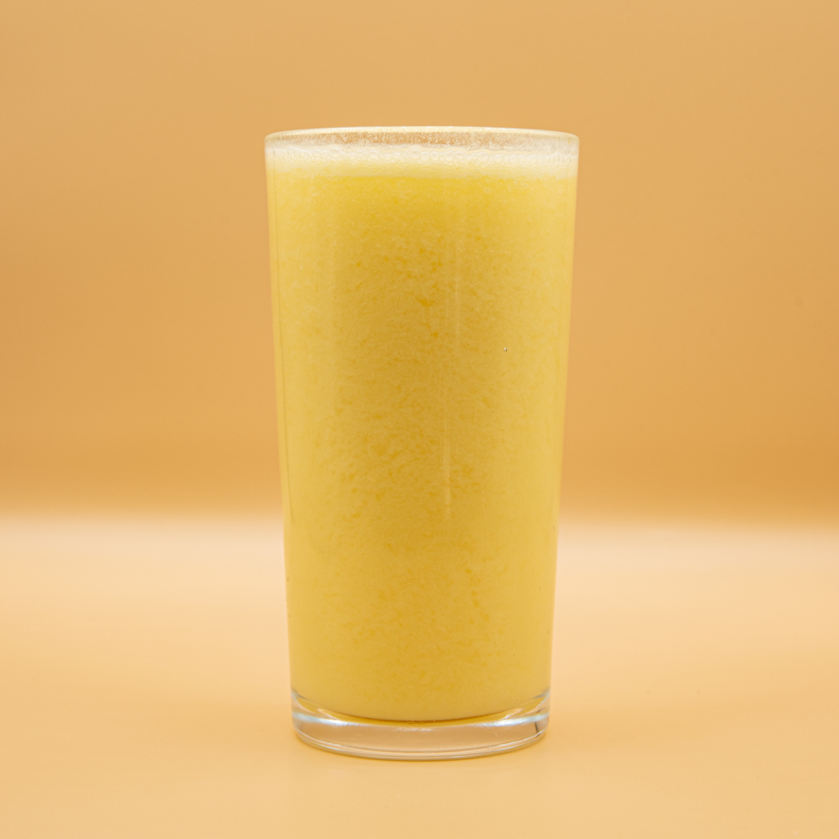 Suco de polpa de Caju. Especificar se é com ou sem açúcar e gelo (imagem ilustrativa do produto)