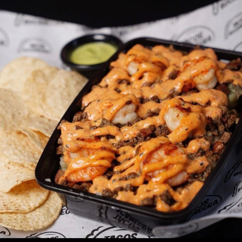 Papa asada mar y tierra