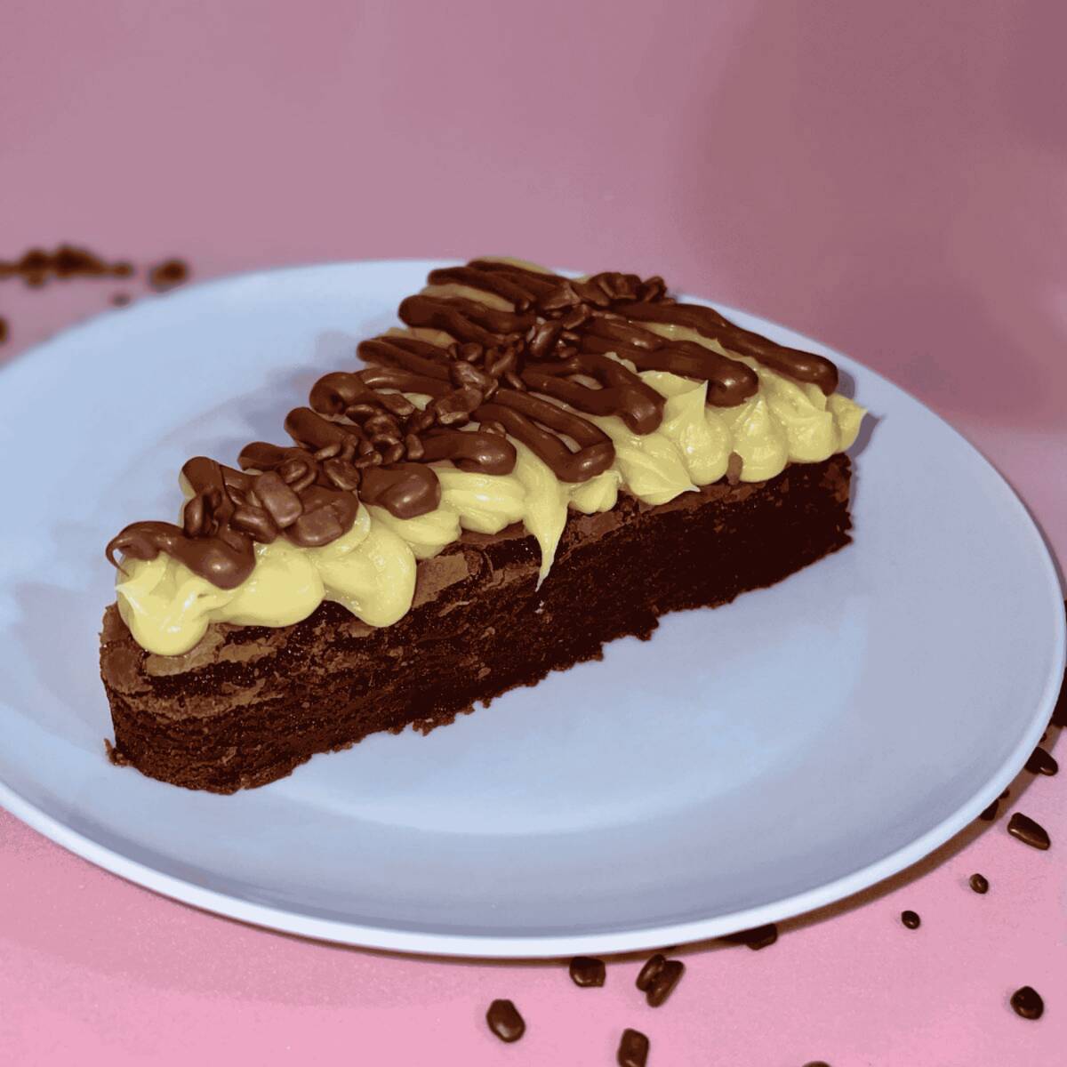 Brownie em fatia em formatado de pizza! Nosso brownie chocolatudo, molhadinho é super cremoso, com uma camada irresistível do nosso recheio de Ninho e Nutella purinha.