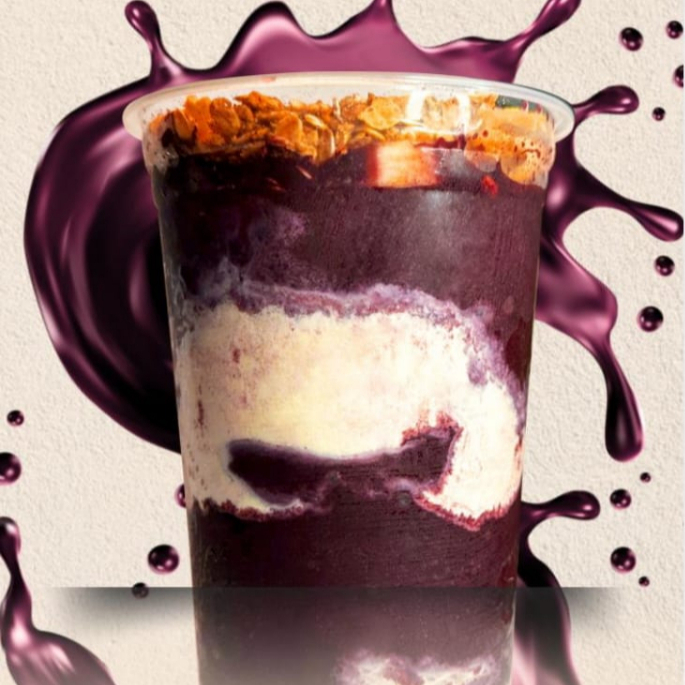 açaí com creme de ninho com nutella mais leite em pó gotas de chocolate granola e leite condensado