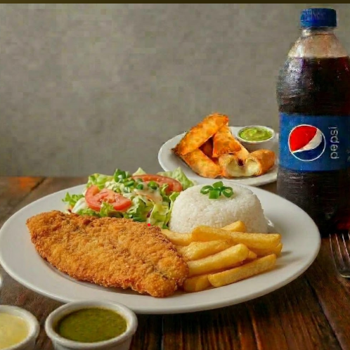 Pescado frito con arroz y papas