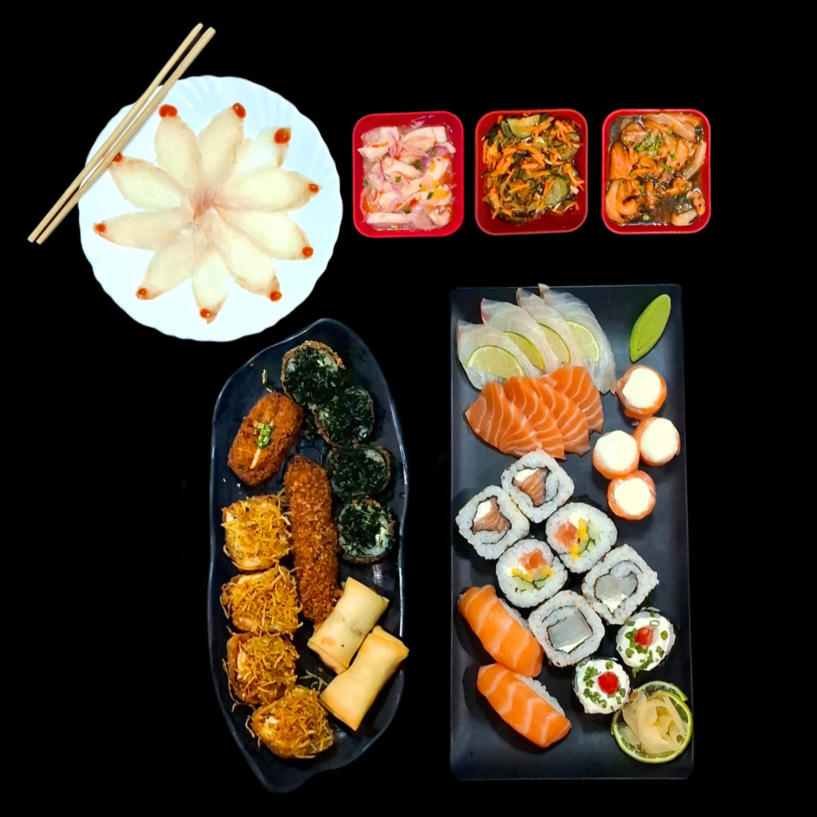 Este item acompanha 1 molho teriyaki/tarê (30ml), 1 molho shoyo (30ml), 1 caldo de limão (23ml) e 2 hashis. 10 sushis variados, 8 sashimis (salmão/tilápia), 4 gunkans, 1 carpáccio (10 lâminas), 1 sunomono (100g), 1 tataki (100g), 1 ceviche (100g), 12 peças fritas variadas. - Obs: não é possível retirar a cebola do ceviche.