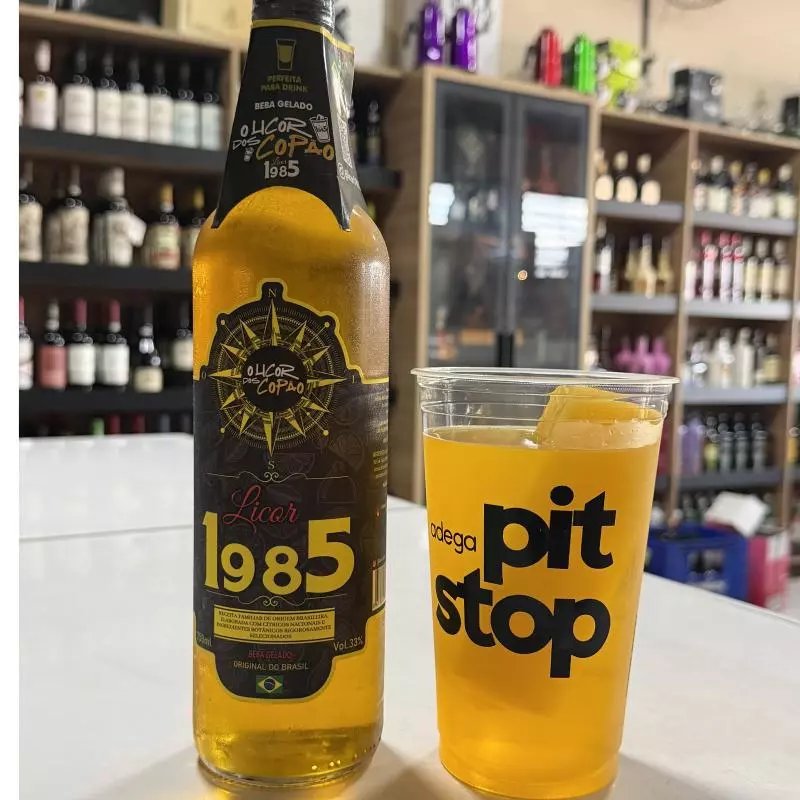 3 doses licor 1985 + gelo de maracujá ou laranja + energético tropical