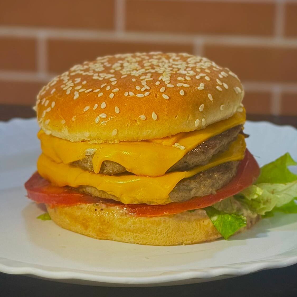 Pão com gergelim , 2 Carnes , 2 Queijo , Alface , Tomate , Billy Jack , Alface , Tomate