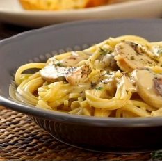 Spaguetti con Champiñones