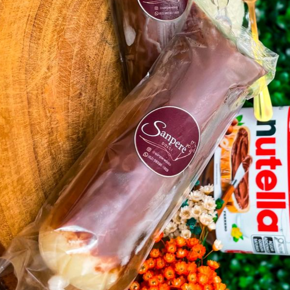 O queridinho do cardápio! Base cremosa de Leite Ninho com muita Nutella de verdade espalhada pelo saquinho. Sobremesa perfeita para refrescar o seu Dia com muito sabor.
Serve até 1 pessoa (Aprox. 140g)