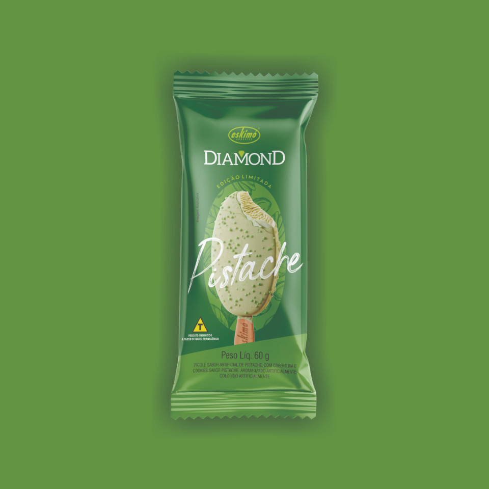 Picolé sabor artificial Pistache, com cobertura de cookies sabor pistache. Peso 60g.