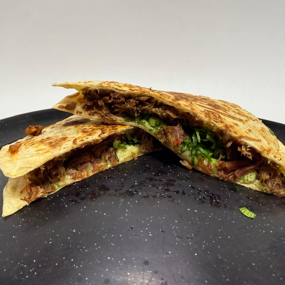 Gringa de Bistec Encebollado