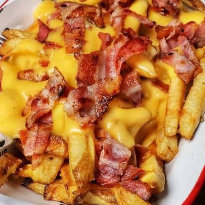 Papas Francesas C/queso y Tocino