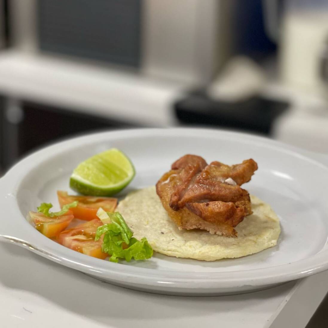 Chicharrón con Arepa