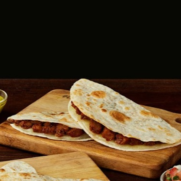 Quesadilla de Harina con Chicharrón en Salsa Verde