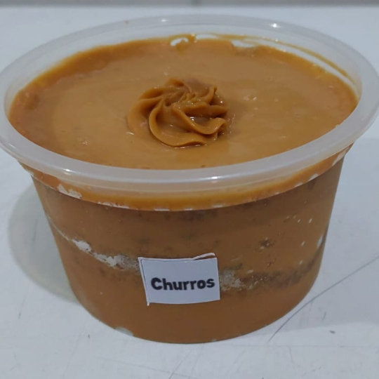 Pote de 250 ml com camadas intercaladas de Bolo de Churros e Recheio de Doce de Leite. ###Tags### bolo no pote bolo vulcao cenoura Ninho chocolate bombom aberto copos da felicidade morango uva coxinha de morango chocolate Ninho Oreo chocolate ao leite leite condensado coco beijinho brigadeiro gourmet tradicional moranguinho churros Nutella 2 amores meio amargo coco queimado presente na caixa promoção cupon cupom oferta desconto como taxa gratis entrega rapida Nutella brownie braunie brawni Ninho doce chocolate brigadeiro docinho donuts docino sobremesa bolo de pote copo da felicidade caseiro banoffee morango Ouro Branco galak Sonho de Valsa choquito ferreiro rocher trufa bombom uva kitkat Kit Kat Kinder bueno charge amendoim Confete Dia dos pais natal Dia das maes Dia das mães namorados