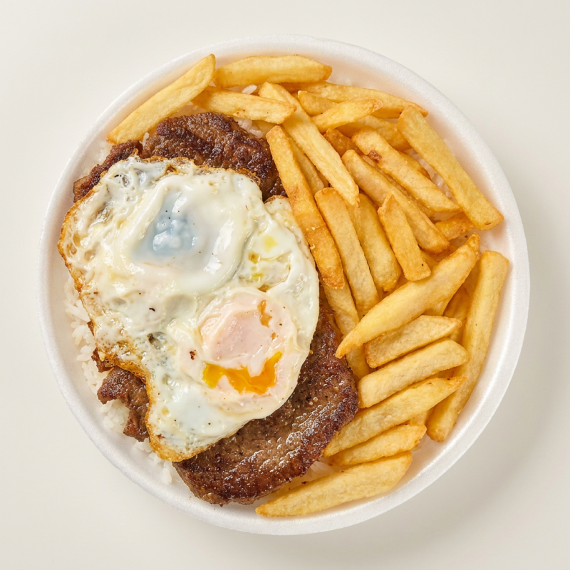 Acompanhado de Arroz branco, Feijão de caldo, Ovo frito e fritas e Farofa da casa.