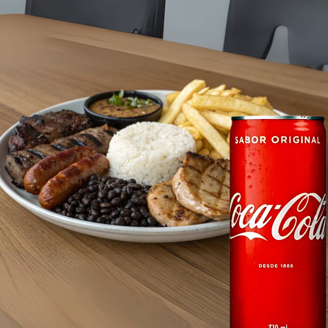 Delicioso churrasquinho misto na chapa com carnes variadas, grelhadas no ponto certo e cheias de sabor. Acompanha arroz soltinho, feijão temperado, farofa crocante e macarrão.