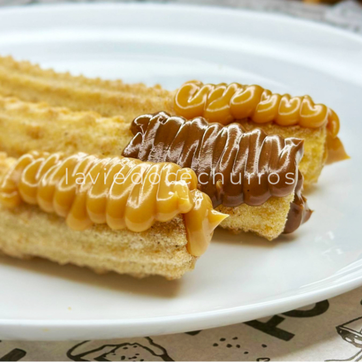 Irresistível é pouco! Leve o Kit com 3 churros para adoçar o seu Dia do jeitinho que você merece! Churros crocantes, fritos na hora. Perfeito para dividir ou para quem ama muito.