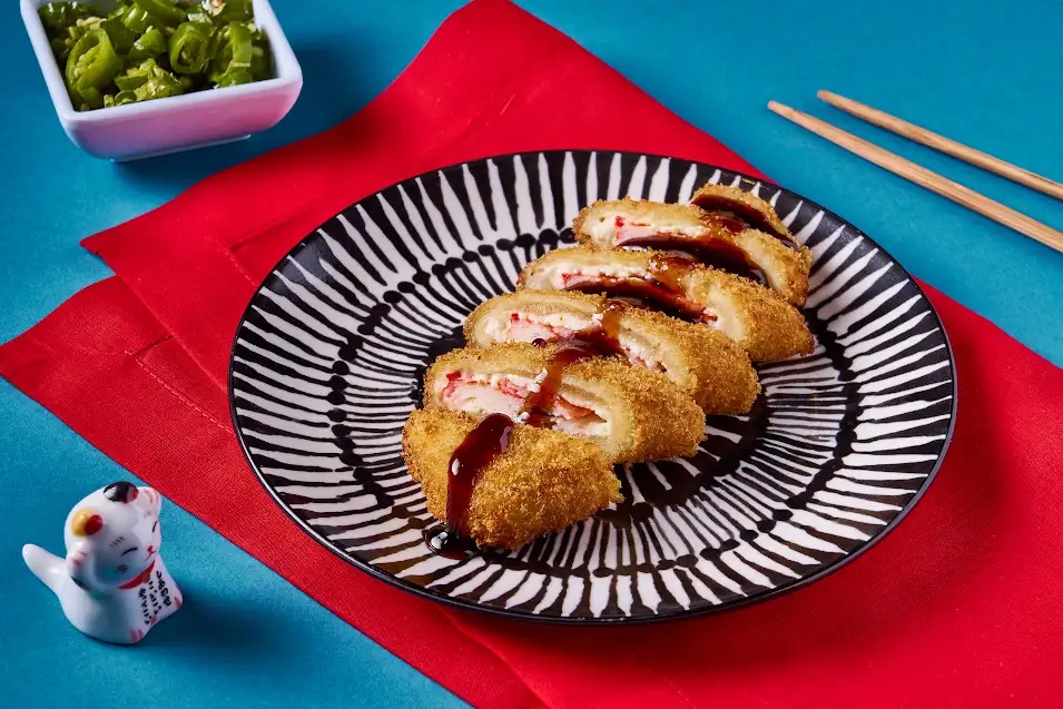 Pechuga Rellena - Empanizada con cangrejo, queso crema y chipotl