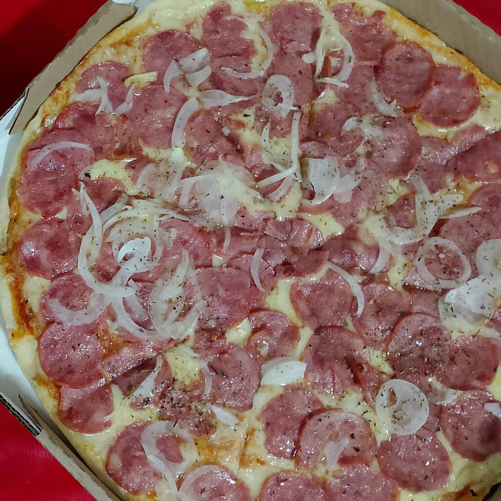 molho especial , mussarela, calabresa e uma bela finalizaçao com oregano