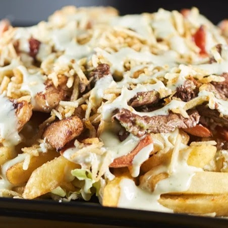 Salchipapa de Pollo y Carne