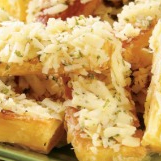 Aipim frito gratinado com parmesão