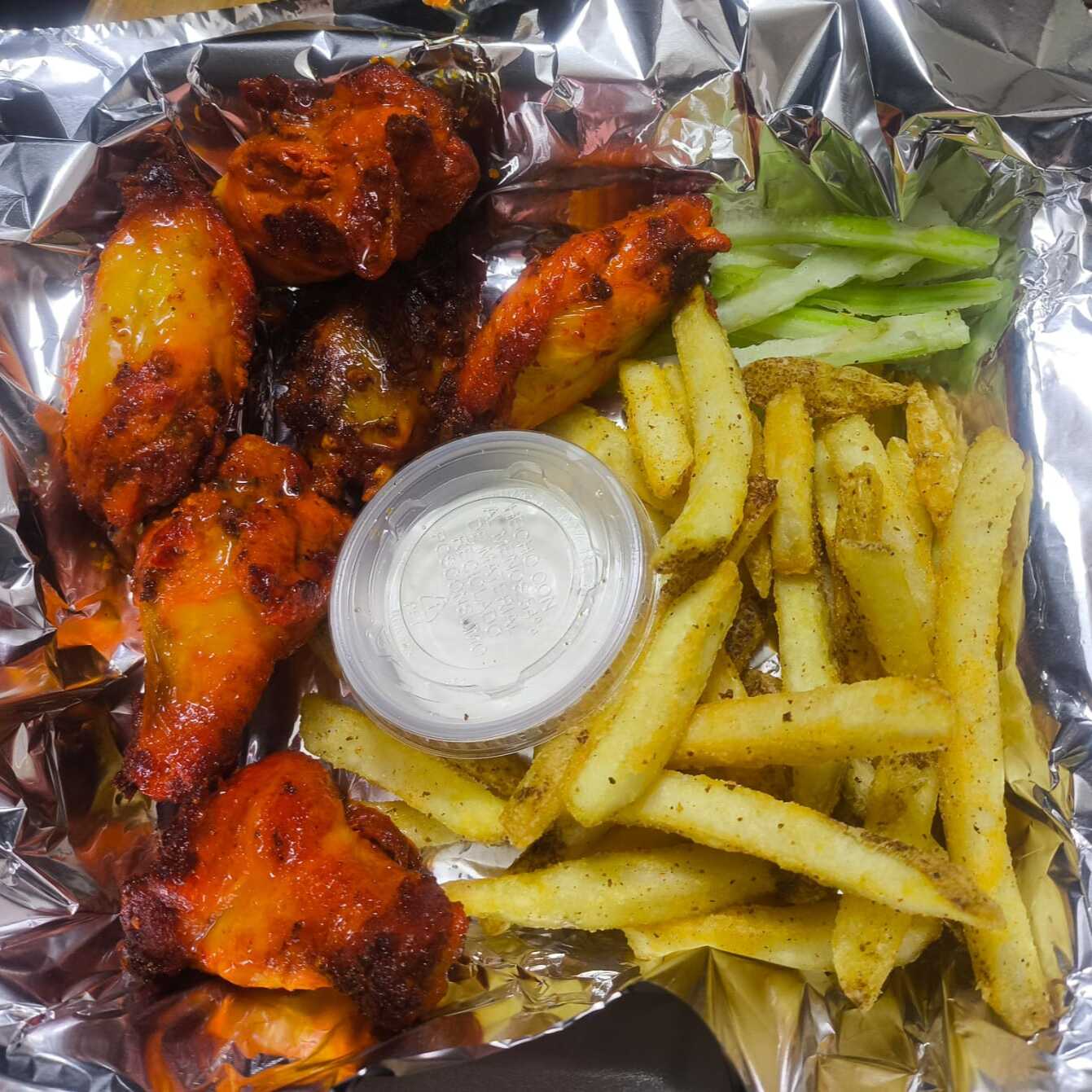 Alitas con papas