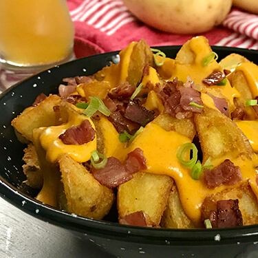 PAPAS CHESSE con TOCINO