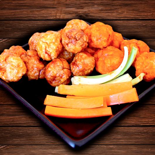 18 Boneless con papas cajun