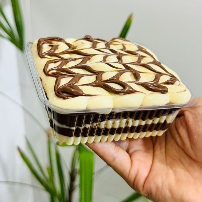 Bolacha maizena da marca Passatempo + cremoso de ninho + nutella pura (montado na hora do pedido para chegar crocante ate vc )